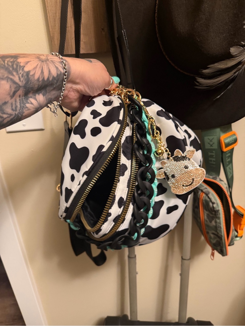 Cow-Print Mini Backpack with Charm - Black & White